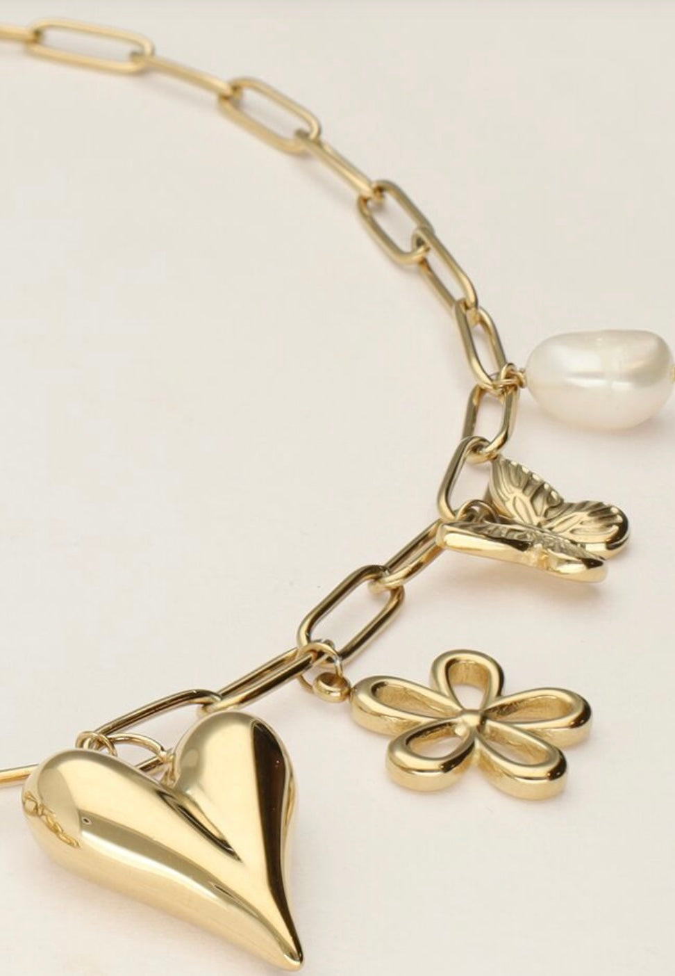 Gliederkette mit Anhängern in gold